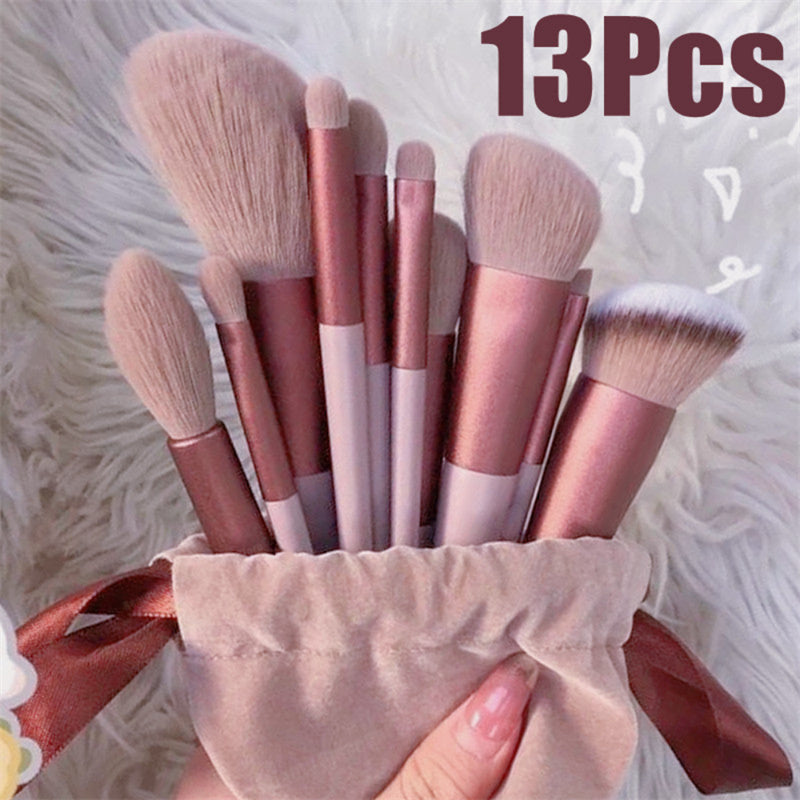 a person holding a bag full of makeup brushes